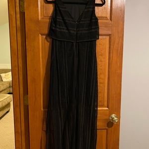 Floor length outer see through layer with slits on side, mini skirt under layer